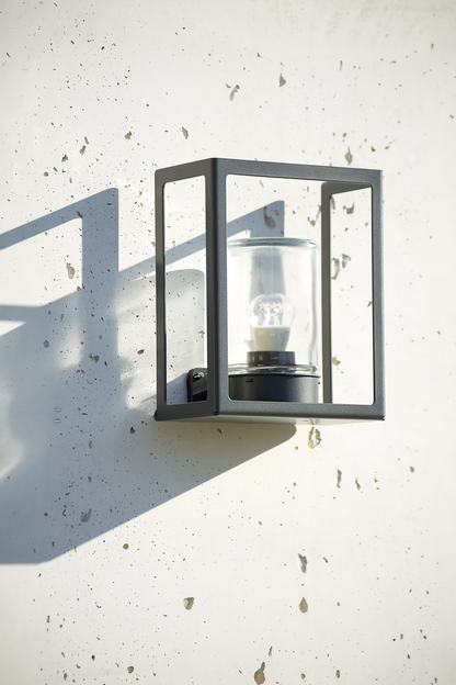 Hugy Clear Glass Decorative Multi-Position Light with Cut-Out and bent Aluminium Body