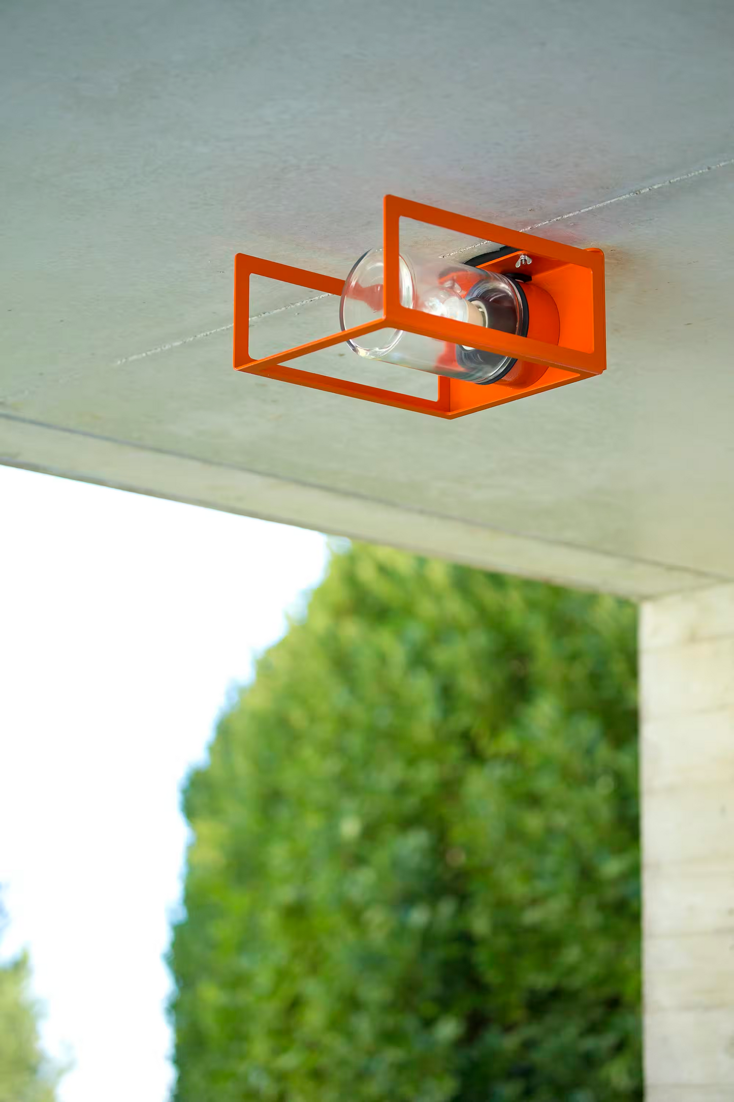 Hugy Clear Glass Decorative Multi-Position Light with Cut-Out and bent Aluminium Body