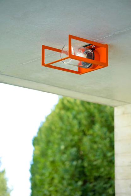 Hugy Clear Glass Decorative Multi-Position Light with Cut-Out and bent Aluminium Body