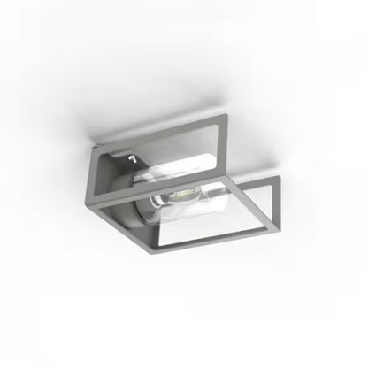 Hugy Clear Glass Decorative Multi-Position Light with Cut-Out and bent Aluminium Body
